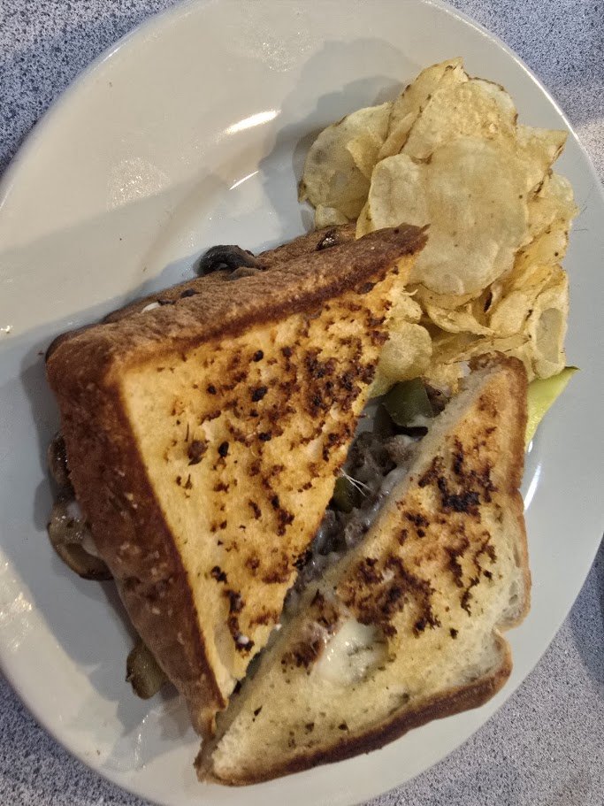 Breakfast dishes in a cozy restaurant setting.